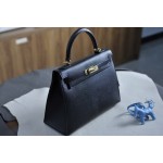 Kelly 28 black gold buckle with extreme pink French sheepskin inside